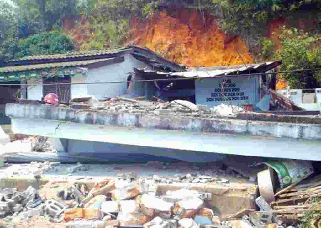 An earthquake damaged building in Tarlay, Burma, March 25, 2011