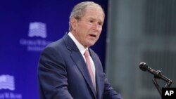 Former U.S. President George W. Bush speaks at a forum sponsored by the George W. Bush Institute in New York, Oct. 19, 2017. Bush is one of the 52 former U.S. officials who has signed a letter supporting the nuclear deal with Iran.