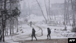 نیروهای دولتی سوریه در شهر حلب در یک برفی زمستانی