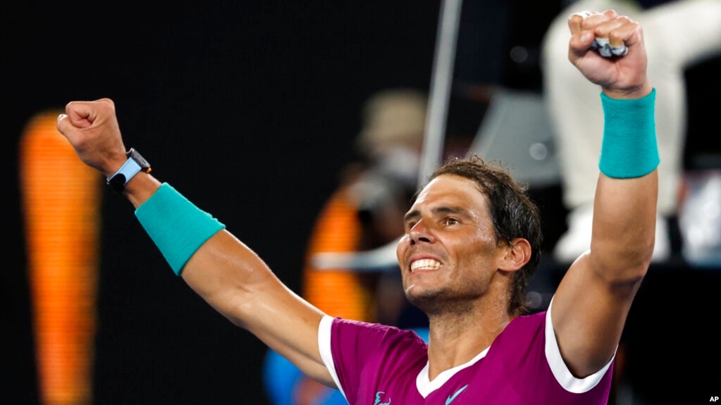 Rafael Nadal of Spain celebrates after defeating Matteo Berrettini of Italy in their semifinal match at the Australian Open tennis championships in Melbourne, Australia, Jan. 28, 2022. (AP Photo/Hamish Blair)