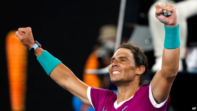 Rafael Nadal of Spain celebrates after defeating Matteo Berrettini of Italy in their semifinal match at the Australian Open tennis championships in Melbourne, Australia, Jan. 28, 2022. (AP Photo/Hamish Blair)