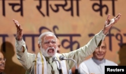 India's Prime Minister Narendra Modi addresses his supporters at Bharatiya Janata Party headquarters in New Delhi, India, March 12, 2017.