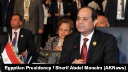 FILE - Egyptian President Abdel Fattah el-Sissi, pictured at an Arab League summit in March, says the agreement to create a free-trade zone uniting three existing blocs represents a "decisive point in the history of African economic integration."