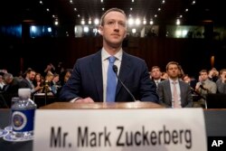FILE - Facebook CEO Mark Zuckerberg testifies before a joint hearing of the Senate Commerce and Judiciary committees on Capitol Hill in Washington, April 10, 2018, about the use of Facebook data to target American voters in the 2016 election.
