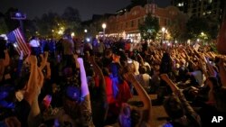 Protesters gather, Sept. 15, 2017, in St. Louis, after a judge found a white former St. Louis police officer, Jason Stockley, not guilty of first-degree murder in the death of a black man, Anthony Lamar Smith, who was fatally shot following a high-speed chase in 2011.