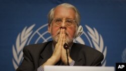 Brazilian Paulo Sergio Pinheiro, who is mandated by the UN Human Rights Council to lead an international investigation of allegations of human rights abuses in Syria, gestures during a press conference at the UN headquarters in Geneva, November 28, 2011.