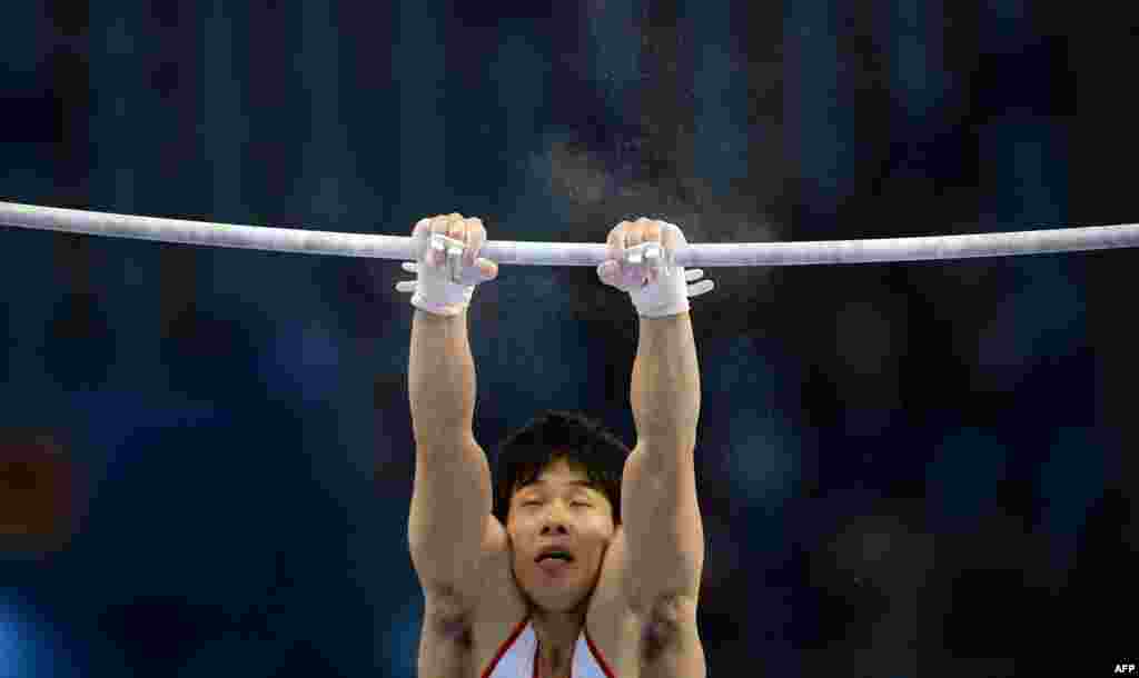 Kazuyuki Takeda of Japan competes in the artistic gymnastics men's individual qualifications and team final event at Namdong Gymnasium during the 2014 Asian Games in Incheon, South Korea.