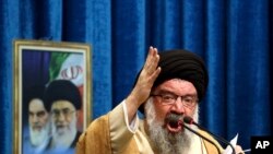 FILE - Iranian senior cleric Ahmad Khatami delivers his sermon during Friday prayer ceremony in Tehran, Iran, Jan. 5, 2018.