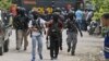 Polisi Tembak Mati Terduga Militan, Tangkap 13 Lainnya di Surabaya