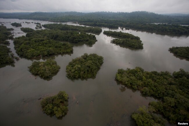 FILE - A view of the section of the Xingu River being flooded by the building of the Belo Monte hydroelectric dam, planned to be the world's third largest, in Pimental, near Altamira in Para state, Nov. 23, 2013.