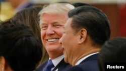 Ông Trump và Chủ tịch Tập Cận BÌnh tại quốc yến ở Trung Quốc cuối năm ngoái.