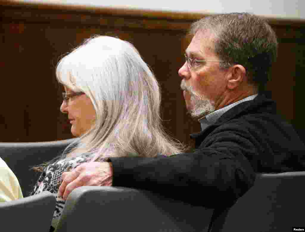 Deby and Wayne Kyle, parents of former Navy SEAL Chris Kyle, listen to testimony during the capital murder trial of former Marine Cpl. Eddie Ray Routh in Stephenville, Texas, Feb. 24, 2015.&nbsp;