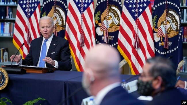 President Joe Biden speaks during a meeting with business leaders about the holiday shopping season, in the library of the Eisenhower Executive Office Building on the White House campus, Nov. 29, 2021, in Washington.