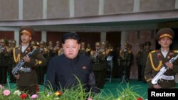 FILE - North Korean leader Kim Jong Un attends the funeral of the late Korean People's Army general Lee Ul Sol, Nov. 8, 2015.