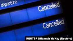 Great Britain, London, An information board is pictured at the Eurostar terminal at St Pancras International, as EU countries impose a travel ban