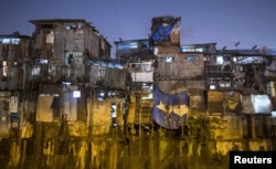 Windows of various shanties in Dharavi, one of Asia's largest slums, are seen in Mumbai, India, Jan. 28, 2015.