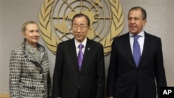 U.S. Secretary of State Hillary Rodham Clinton, and Russian Foreign Minister Sergei Lavrov flank U.N. Secretary-General Ban Ki-moon, center, at United Nations headquarters, March 12, 2012.