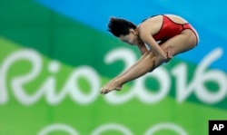 China's gold medalist Ren Qian competes during the women's 10-meter platform diving final in the Maria Lenk Aquatic Center at the 2016 Summer Olympics in Rio de Janeiro, Brazil, Aug. 18, 2016.