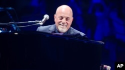 FILE - Billy Joel performs at Madison Square Garden in New York, May 9, 2014.