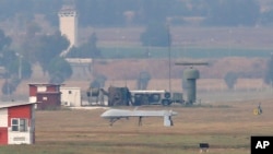 An unmanned aerial vehicle maneuvers on the runway after it landed at the Incirlik Air Base, on the outskirts of the city of Adana, southern Turkey, July 30, 2015. 