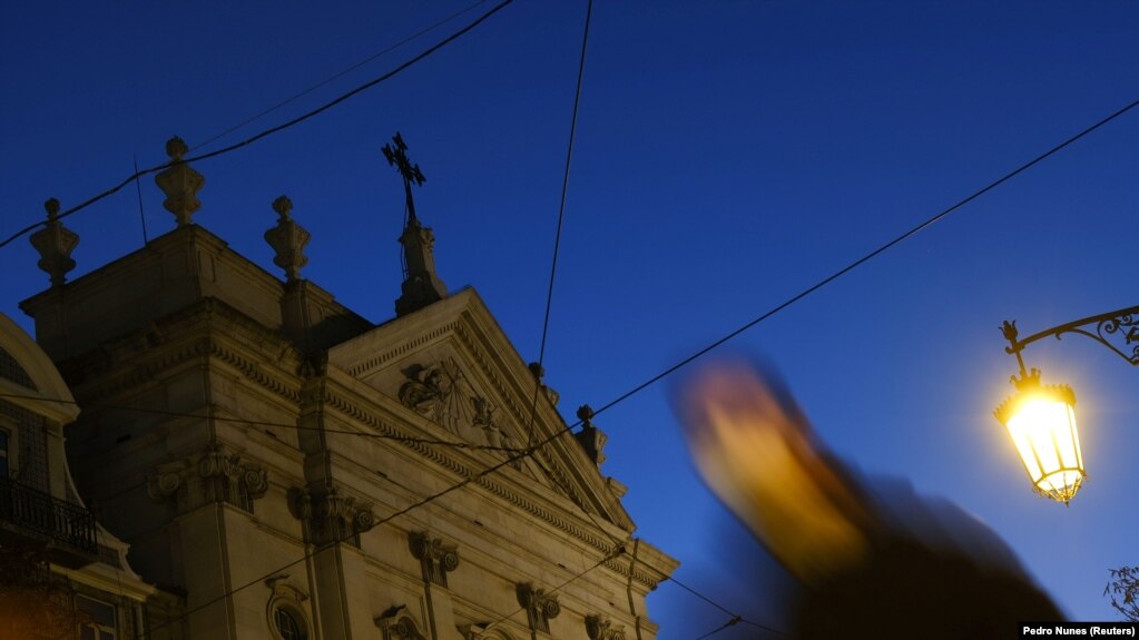 A person walks near a church in downtown Lisbon, Portugal, Dec. 2, 2021. Portugal says it is ready to investigate possible cases of abuse of minors within the Catholic Church. (Photo: REUTERS/Pedro Nunes)
