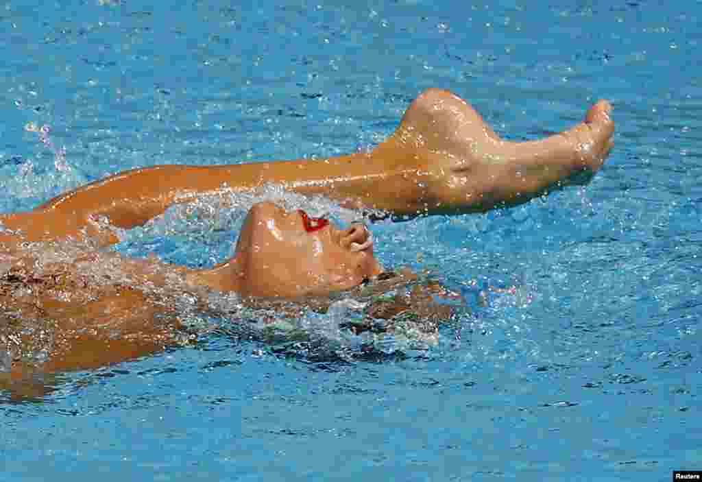 Spain's Ona Carbonell performs during the synchronized swimming solo free routine preliminary at the Aquatics World Championships in Kazan, Russia.