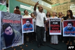 FILE - Pakistani demonstrators take part in a protest the killing of journalism student Mashal Khan in Karachi, April 22, 2017.