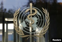 A logo is pictured on the World Health Organization (WHO) headquarters in Geneva, Switzerland, November 22, 2017. REUTERS/Denis Balibouse.