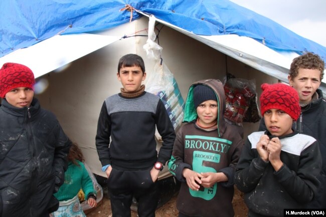 Children, pictured in al-Hol Camp, Syria, March 4, 2019, say they felt safer living in a war zone than they do in the camp, because they were told that IS militants were protecting them.