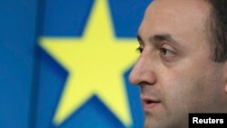 Georgian Prime Minister Irakli Garibashvili speaks at a news conference at an European Union leaders summit in Brussels.