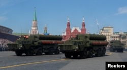 FILE - Russian S-400 missile air defense systems are on display during a parade at Red Square in Moscow, Russia, May 9, 2018.