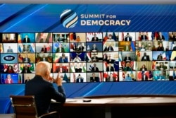 President Joe Biden speaks from the South Court Auditorium on the White House complex in Washington, Dec. 9, 2021, for the opening of the Democracy Summit.