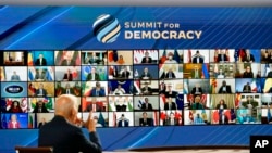 President Joe Biden speaks from the South Court Auditorium on the White House complex in Washington, Dec. 9, 2021, for the opening of the Democracy Summit. 