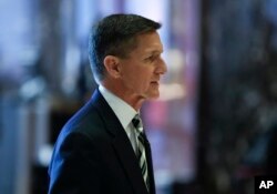 Retired Lt. Gen Michael Flynn walks through the lobby at Trump Tower, Thursday, Nov. 17, 2016, in New York. Flynn has been appointed as Trump's National Security Advisor and has strongly come out against the deal with Iran.