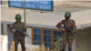 Regime soldiers guarding outside the Public Health Department at Mindat in early May (Photo credit: Chin Human Rights Organization/ Facebook) 