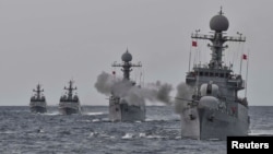 South Korea's naval ships take part in a military drill for possible attack from North Korea in the water of the East Sea, South Korea, Sept. 5, 2017. 