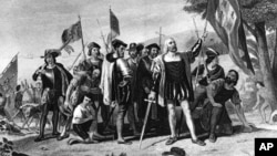 Historic painting of Christopher Columbus. He and his sailors stand in triumph at least on San Salvador, the Bahamas, on Oct. 12, 1492.