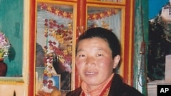 Tibetan nun Palden Chetso who died after setting herself on fire in southwestern China is seen in this undated file photo.