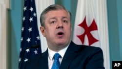 Georgian Prime Minister Giorgi Kvirikashvili speaks during a news conference before a bilateral meeting with Secretary of State Mike Pompeo at State Department, May 21, 2018, in Washington. 