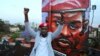 FILE - Ugandan politician Robert Kyagulanyi Ssentamu, better known as Bobi Wine, gestures in Nairobi, Kenya, Oct. 12, 2018. 