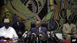 Senegal's President Abdoulaye Wade speaks to journalists at a news conference in Dakar, February 27, 2012. Wade was locked in a tight race with his main rival, Macky Sall, on Monday as unofficial vote tallies pointed to a possible run-off between the two 