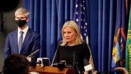 Oakland County prosecutor Karen McDonald addresses the media in her office, Friday, Dec. 3, 2021, in Pontiac, Mich. (AP Photo/Carlos Osorio)