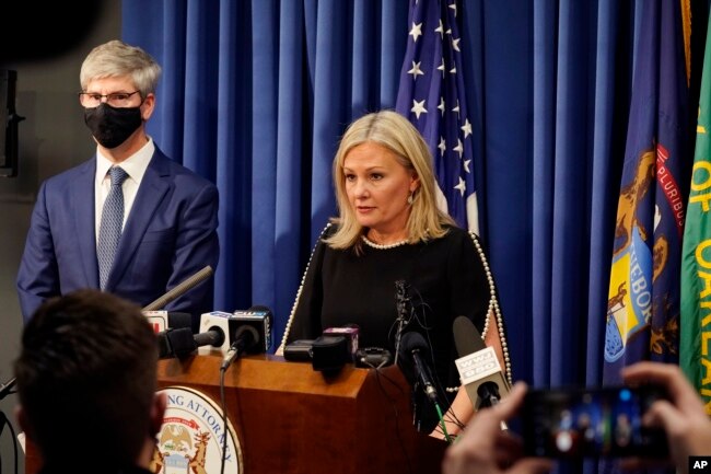 Oakland County prosecutor Karen McDonald addresses the media in her office, Friday, Dec. 3, 2021, in Pontiac, Mich. (AP Photo/Carlos Osorio)