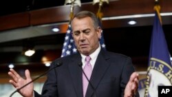 FILE - House Speaker John Boehner gestures while speaking during a news conference on Capitol Hill in Washington Feb. 6, 2014.