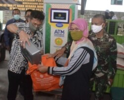 ATM beras. (Foto: Kementerian Pertanian)