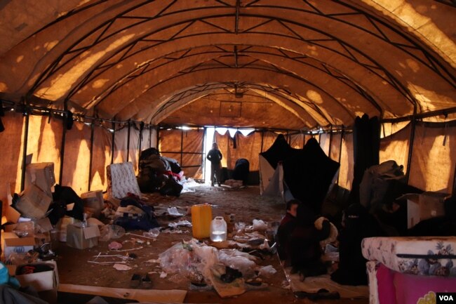 Al-Hol camp does not have enough small tents to house new arrivals, so many crowd into larger spaces that are generally dirty, cold and unsafe for children on March 4, 2019 in al-Hol Camp, Syria.
