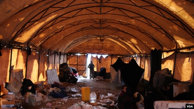 Al-Hol camp does not have enough small tents to house new arrivals, so many crowd into larger spaces that are generally dirty, cold and unsafe for children on March 4, 2019 in al-Hol Camp, Syria.