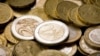 FILE - An image displays euro coins.