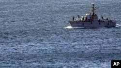 An Israeli military naval ship patrols inside the port of Ashdod, in the Mediterranean Sea, Israel, March 15, 2011.