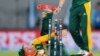 South Africa's AB de Villiers falls over as he attempts a run out during their Cricket World Cup semifinal against New Zealand in Auckland, New Zealand, Tuesday, March 24, 2015. (AP Photo/David Rowland)